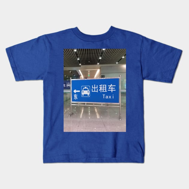 Taxi sign :at train station in China Kids T-Shirt by Stephfuccio.com